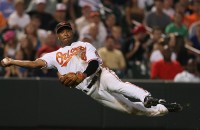 Orioles third baseman Melvin Mora makes a play